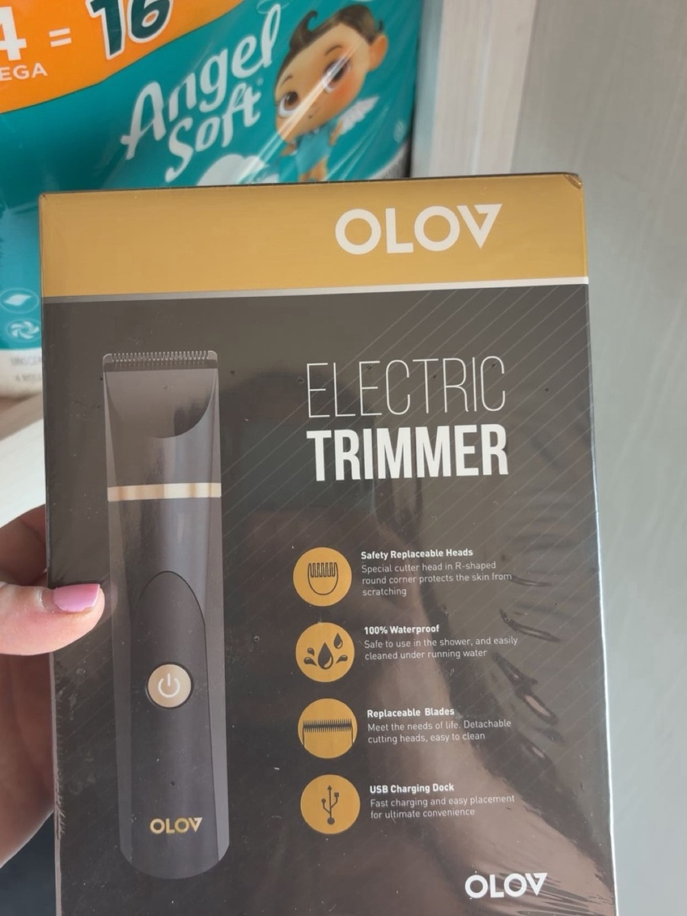 Brand new: OLOV Electric Trimmer in Black and Gold ( designed for body grooming)